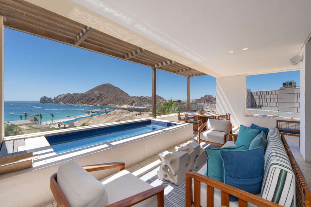 Los Cabos Amaterra 2BR/2BA oceanside condo in prime Cabo San Lucas location, less than a 5-minute walk to the beach. Bright, open-concept living and dining area with abundant natural light and access to private terrace. Modern kitchen with ample cabinetry and workspace. Spacious primary suite with en-suite bath; well-sized second bedroom with adjacent full bath. Ideal for vacation home, rental investment, or full-time residence. Close to beaches, restaurants, shopping, and downtown Cabo amenities. Condo unit comes with 2 underground parking stalls as well. – 1 Homes Cabo, Cabo San Lucas, Cabo San Lucas, BS