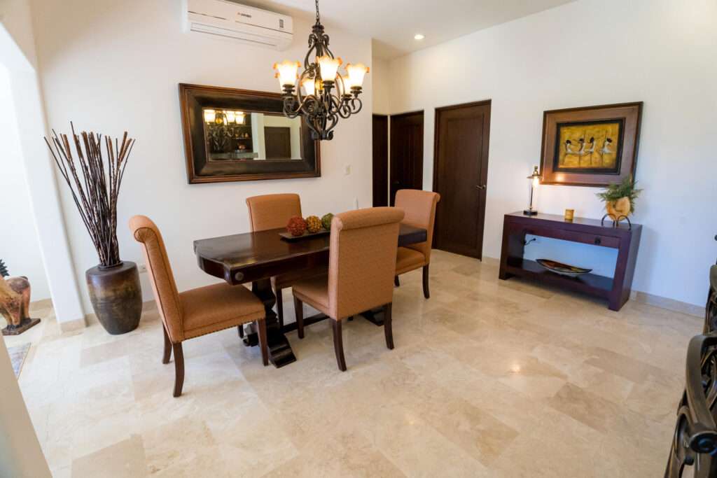 Los Cabos Villa La Estancia Luxurious 2-bedroom, 3-bath full-ownership residence located within one of only two beachfront resorts on Medano Beach in Cabo San Lucas. This spacious unit features a fully equipped kitchen with stainless steel appliances and pantry, opening to a comfortable living and dining area. The expansive primary suite offers a king bed, sitting area, workspace, and spa-style bath with Jacuzzi tub, walk-in shower, and double vanity. Guest bedroom includes two queen beds and en-suite bath. Both bedrooms and living area open to a large terrace with garden and ocean – 123A LAS CONCHAS, Cabo Corridor, BS