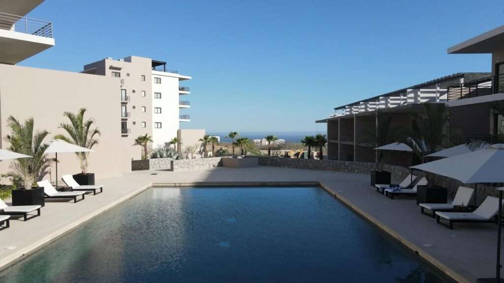 Los Cabos Breeze Of Cabo Discover the charm of Ground Floor Unit #103 at Breeze of Cabo, located in the sought-after Sunset area of Cabo San Lucas.This modern 2-bedroom, 2-bathroom condo features a spacious private patio — perfect for enjoying the warm weather and outdoor living. , the unit includes underground parking and access to a shared rooftop with a swimming pool and panoramic ocean – 2 BED Tower G Salomon de la Cruz, Cabo Corridor, BS