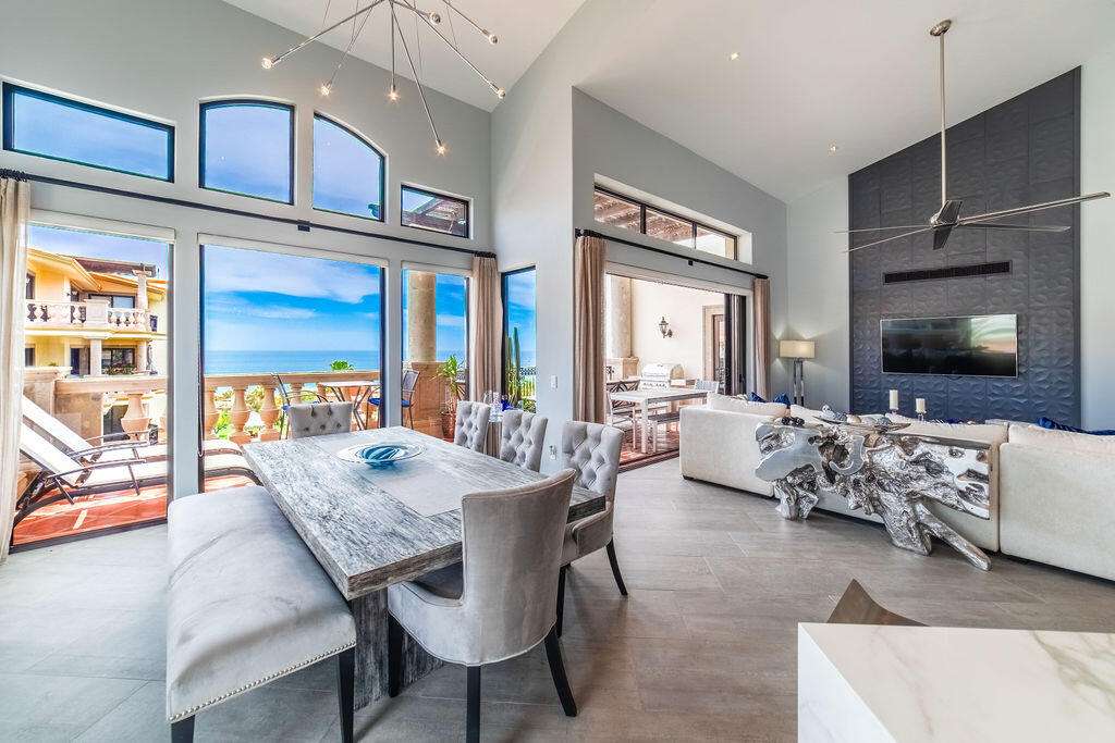 Los Cabos Puerta Del Sol-Cdsol Perched to capture sweeping ocean vistas, undoubtably THE MOST ATTRACTIVE & fully updated and remodeled 3-bedroom condo offers a rare blend of luxury, comfort, and elevated design. Vaulted ceilings create a dramatic sense of space and light, while the open-concept layout seamlessly connects the expansive living and dining areas to a generous outdoor terrace--perfect for entertaining or simply soaking in the endless blue horizon.Thoughtfully redesigned, the residence features upgraded finishes throughout, including modernized kitchen and baths, enhanced air conditioning, and high-quality doors and windows built for both style and durability. Each bedroom is well-proportioned, with the primary suite offering a private retreat complete with serene – A405 Puerta del Sol, Cabo Corridor, BS