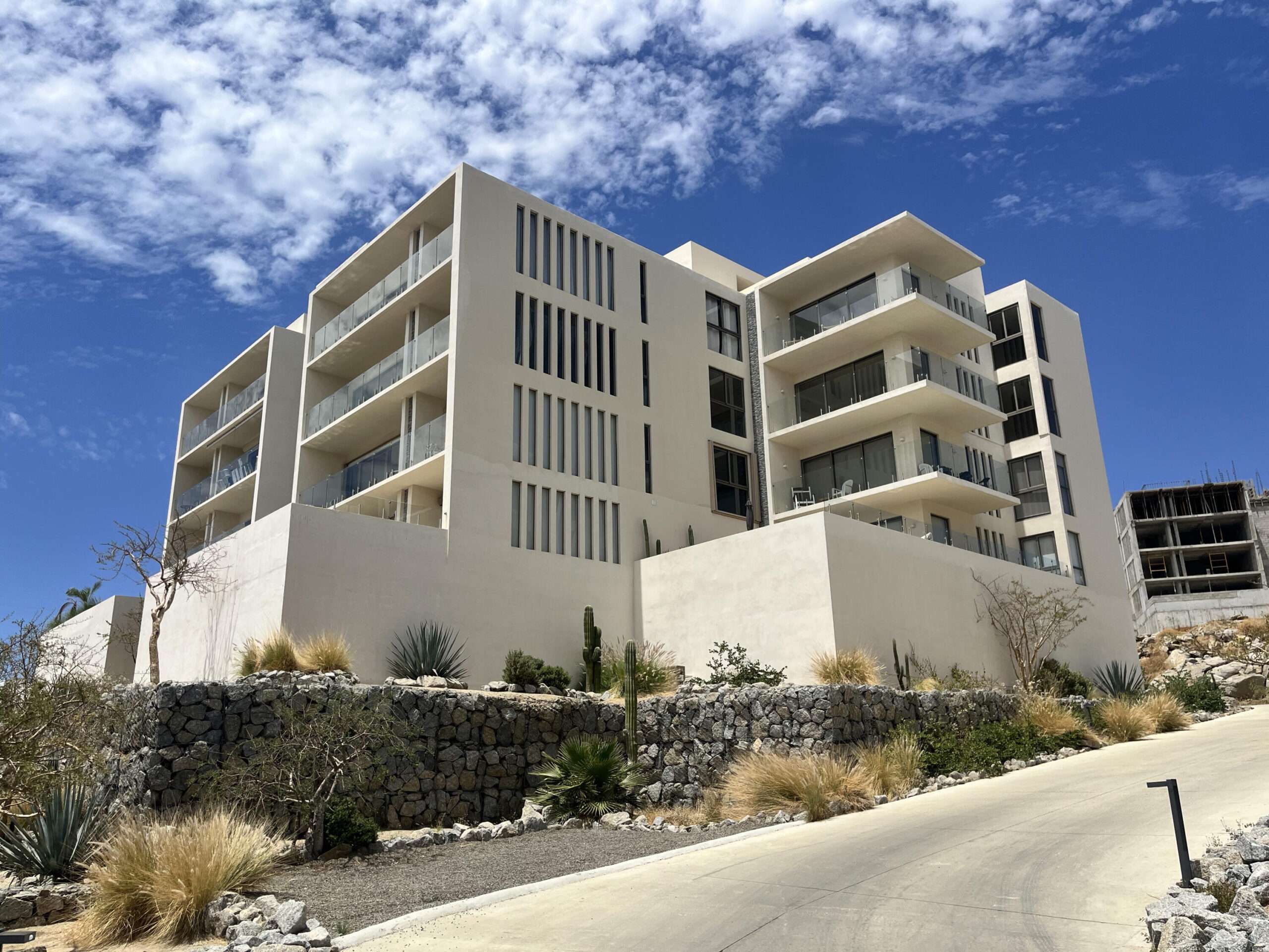 Los Cabos Dunna Welcome to Dunna - A New Standard of Luxury in Cabo. More than a residence, Dunna is a vibrant, fully integrated community where luxury, culture, and recreation converge. Designed by renowned architect Sordo Madaleno, this visionary development seamlessly blends timeless elegance with natural tranquility, offering meticulously crafted residences and garden villas complemented by world-class amenities. Elevated Living, Unmatched Experiences Choose from 13 thoughtfully designed floor plans from 2 - 5 bedrooms ranging from 1,475 - 6,458 sq. ft., featuring seamless indoor-outdoor living, elegant finishes, private rooftops, Jacuzzis, and lush garden terraces. Resort-Style AmenitiesEnjoy unparalleled amenities, including:" Infinity pools (Adults-only, Family, Kids & Oasis)" State-of-the-art wellness & fitness center" Luxury spa (sauna, steam, ice baths, massage suites)" Exclusive rooftop lounges & panoramic for sale