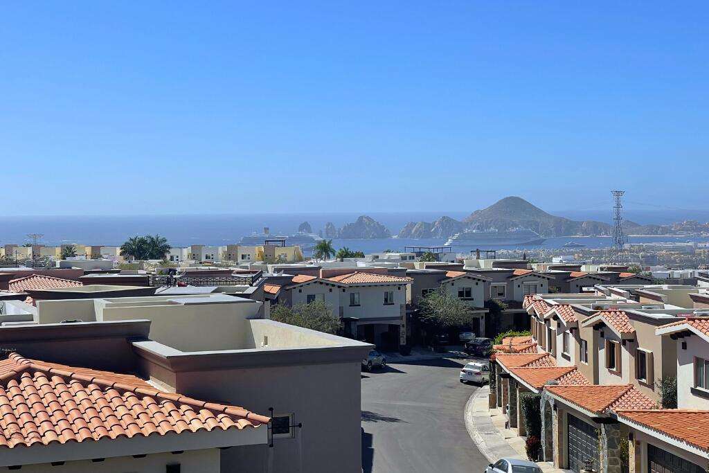 Los Cabos Terranova Beautiful turnkey two-story corner home located in the gated community of Terranova Residencial. The main level offers an inviting living and dining area, a kitchen with granite countertops and pantry. Also a flex room ideal as a guest bedroom or home office.The second level features three bedrooms, including a spacious primary suite with walk-in closet, bathtub, and double vanity, plus two additional bedrooms connected by a Jack-and-Jill bathroom.Enjoy a private backyard with an 80 mΒ² garden, swimming pool, and BBQ area, perfect for entertaining. The rooftop terrace with pergola and BBQ area offers beautiful sunset for sale