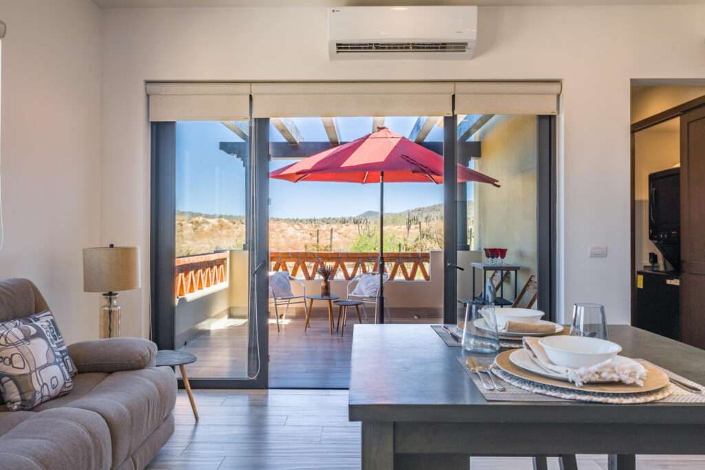 Los Cabos Dunes Residence Club Enjoy resort-style living with this 3-bedroom corner ground-floor residence at The Palmilla Dunes. This contemporary-style condo is offered fully furnished and turn-key, blending modern design with warm finishes, including travertine floors, parota wood furnishings, and GE Profile appliances. The ''Palm Garden Residence'' layout features a primary bedroom with a king bed and private terrace, plus two back bedrooms, one with two double beds and one with a king, making it ideal for family and guests. Indoor-outdoor living is seamless with pocket doors, a covered exterior terrace, and BBQ area, complemented by a private putting green perfect for fun and entertaining. An oversized one-car garage is located directly in front of the unit, and a luxury six-seater golf cart is included for convenient access to Palmilla's shopping centers, restaurants, and swimmable beach.Whether you're looking for a private vacation retreat or an investment rental, this property offers a ready-to-enjoy lifestyle, with optional access to The Dunes Club amenities, including tennis, pickleball, and paddle courts, gym and spa, semi-Olympic pool, jacuzzi, movie theater, sports bar, and clubhouse. – Financing Optional, Pacific, BS