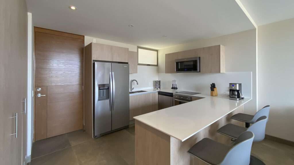 Los Cabos Idaho Condos Bright, spacious 2-bed, 2-bath condo, freshly updated with paint, updated cabinets, and quartz countertops. This stylish, move-in-ready home features a private patio just steps from a beautifully landscaped pool, plus access to the shared rooftop terrace with sweeping ocean – LADERA Condo, San Jose Corridor, San Jose Corridor, BS