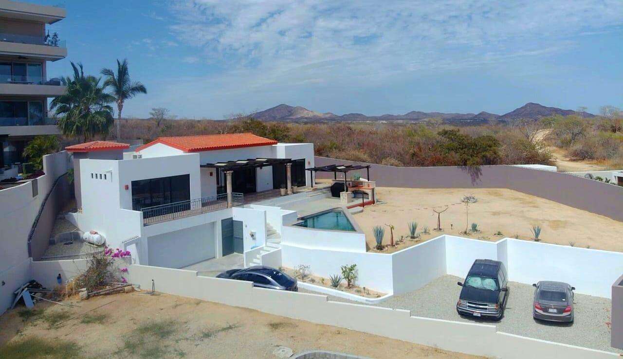 Los Cabos El Tezal-Oceanside:General Located along the highly sought-after Cabo Corridor, this charming 2-bedroom, 2-bathroom open-concept home is set within a lush, private garden oasis filled with mature tropical landscaping. The seamless indoor-outdoor layout flows effortlessly into a stunning lagoon-style pool, creating a peaceful, resort-like setting ideal for relaxing or entertaining.With its expansive grounds and prime location on the corridor just minutes from downtown Cabo San Lucas, the property offers incredible flexibility. Whether envisioned as a private residence, boutique event space and hotel, or future condo development, this is a rare opportunity to own a versatile property in one of Cabo's fastest-growing areas. for sale