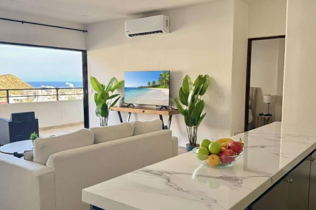 Los Cabos Luxotica Ii Luxotica delivers easy Cabo living in the Sunset area—close to the marina, restaurants, shopping, and beaches. This bright 2 bed / 2 bath third-floor condo comes fully furnished and equipped, ready to move in or rent immediately. Strong rental history makes it ideal for investors, seasonal owners, or full-time living. The unit includes private parking, plus access to a shared rooftop with panoramic – Sunset CSL Turn-Key, Cabo San Lucas, BS