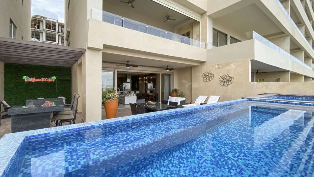 Los Cabos Breeze Of Cabo Discover the charm of Ground Floor Unit #103 at Breeze of Cabo, located in the sought-after Sunset area of Cabo San Lucas.This modern 2-bedroom, 2-bathroom condo features a spacious private patio — perfect for enjoying the warm weather and outdoor living. , the unit includes underground parking and access to a shared rooftop with a swimming pool and panoramic ocean – Vista Vela II, Cabo Corridor, BS