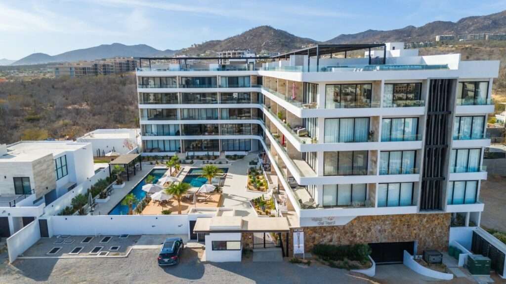 Los Cabos Dunna Welcome to Dunna - A New Standard of Luxury in Cabo. More than a residence, Dunna is a vibrant, fully integrated community where luxury, culture, and recreation converge. Designed by renowned architect Sordo Madaleno, this visionary development seamlessly blends timeless elegance with natural tranquility, offering meticulously crafted residences and garden villas complemented by world-class amenities. Elevated Living, Unmatched Experiences Choose from 13 thoughtfully designed floor plans from 2 - 5 bedrooms ranging from 1,475 - 6,458 sq. ft., featuring seamless indoor-outdoor living, elegant finishes, private rooftops, Jacuzzis, and lush garden terraces. Resort-Style AmenitiesEnjoy unparalleled amenities, including:" Infinity pools (Adults-only, Family, Kids & Oasis)" State-of-the-art wellness & fitness center" Luxury spa (sauna, steam, ice baths, massage suites)" Exclusive rooftop lounges & panoramic – Vistas del Tezal #304, Cabo Corridor, Cabo Corridor, BS